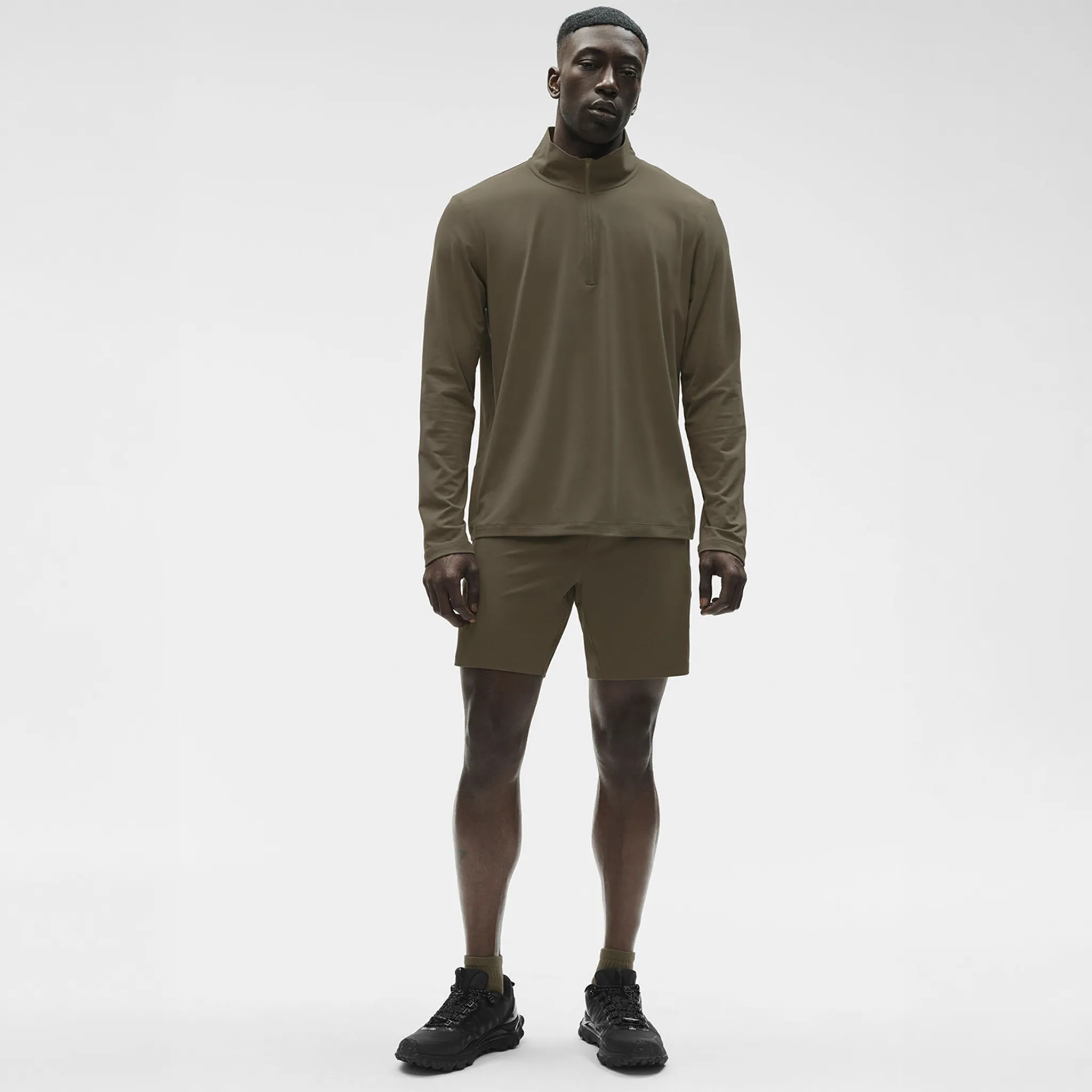 Front View of Alo Yoga Conquer Reform Olive Tree L/S 1/4 Zip